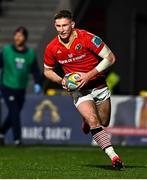 28 February 2025; Ben O'Connor of Munster on his way to scoring his side's third try during the United Rugby Championship match between Munster and Edinburgh at Virgin Media Park in Cork. Photo by Tyler Miller/Sportsfile