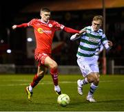 28 February 2025; Sean Gannon of Shelbourne in action against Michael Noonan of Shamrock Rovers during the SSE Airtricity Men's Premier Division match between Shelbourne and Shamrock Rovers at Tolka Park in Dublin. Photo by Stephen McCarthy/Sportsfile