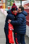 28 February 2025; Tyreke Wilson of Shelbourne with Shelbourne media officer Darren Cleary before the SSE Airtricity Men's Premier Division match between Shelbourne and Shamrock Rovers at Tolka Park in Dublin. Photo by Stephen McCarthy/Sportsfile