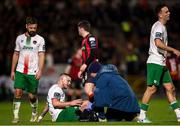 28 February 2025; Sean Murray of Cork City receives medical attention during the SSE Airtricity Men's Premier Division match between Cork City and Bohemians at Turner's Cross in Cork. Photo by Michael P Ryan/Sportsfile