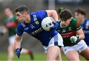 1 March 2025; Paul Geaney of Kerry in action against Sam Callinan of Mayo during the Allianz Football League Division 1 match between Mayo and Kerry at Hastings Insurance MacHale Park in Castlebar, Mayo. Photo by David Fitzgerald/Sportsfile