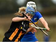 1 March 2025; Mary O'Connell of Kilkenny is tackled by Niamh Treacy of Tipperary during the Very National Camogie League Division 1A match between between Tipperary and Kilkenny at The Ragg GAA Grounds in Tipperary. Photo by Tom Beary/Sportsfile