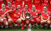 1 March 2025; Shelbourne players, from left, Leah Doyle, Gabby DelPico, Jemma Quinn, Noelle Murray, Pearl Slattery and Rachel Graham celebrate with the FAI President's Cup after the 2025 Women's President's Cup match between Shelbourne and Athlone Town at Tolka Park in Dublin. Photo by Stephen McCarthy/Sportsfile