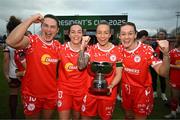 1 March 2025; Shelbourne players, from left, Jemma Quinn, Noelle Murray, Pearl Slattery and Rachel Graham celebrate with the FAI President's Cup after the 2025 Women's President's Cup match between Shelbourne and Athlone Town at Tolka Park in Dublin. Photo by Stephen McCarthy/Sportsfile