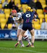1 March 2025; Conor Whelan of Galway in action against Damien Reck of Wexford during the Allianz Hurling League Division 1A match between Wexford and Galway at Chadwicks Wexford Park in Wexford. Photo by Stephen Marken/Sportsfile
