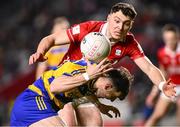1 March 2025; Diarmuid Murtagh of Roscommon in action against Daniel O'Mahony of Cork during the Allianz Football League Division 2 match between Cork and Roscommon at SuperValu Páirc Uí Chaoimh in Cork. Photo by Piaras Ó Mídheach/Sportsfile