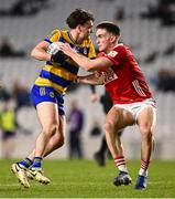 1 March 2025; Ben O'Carroll of Roscommon in action against Tommy Walsh of Cork during the Allianz Football League Division 2 match between Cork and Roscommon at SuperValu Páirc Uí Chaoimh in Cork. Photo by Piaras Ó Mídheach/Sportsfile