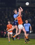 1 March 2025; Tom Lahiff of Dublin in action against Connaire Mackin of Armagh during the Allianz Football League Division 1 match between Armagh and Dublin at the BOX-IT Athletic Grounds in Armagh. Photo by Ben McShane/Sportsfile