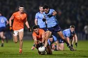 1 March 2025; Stefan Campbell of Armagh is tackled by Niall Scully of Dublin during the Allianz Football League Division 1 match between Armagh and Dublin at the BOX-IT Athletic Grounds in Armagh. Photo by Ben McShane/Sportsfile