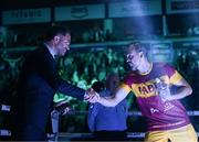 1 March 2025; Chairman and promoter of Matchroom Boxing Eddie Hearn, left, and Trainer Andy Lee shake hands before the IBF welterweight eliminator bout between Paddy Donovan and Lewis Crocker at SSE Arena in Belfast. Photo by Ramsey Cardy/Sportsfile