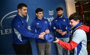 1 March 2025; Leinster players James Culhane, Cormac Foley and Michael Milne with supporters in Autograph Alley before the United Rugby Championship match between Leinster and Cardiff Rugby at the Aviva Stadium in Dublin. Photo by Seb Daly/Sportsfile
