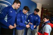 1 March 2025; Leinster players James Culhane, Cormac Foley and Michael Milne with supporters in Autograph Alley before the United Rugby Championship match between Leinster and Cardiff Rugby at the Aviva Stadium in Dublin. Photo by Seb Daly/Sportsfile
