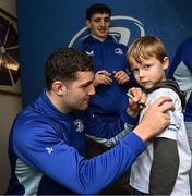 1 March 2025; Leinster players James Culhane, Cormac Foley and Michael Milne with supporters in Autograph Alley before the United Rugby Championship match between Leinster and Cardiff Rugby at the Aviva Stadium in Dublin. Photo by Seb Daly/Sportsfile