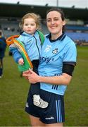 1 March 2025; Hannah Tyrrell of Dublin with her one and a half year old daughter Aoife Tyrrell Turnbull after the Lidl Ladies National Football League Division 1 match between Dublin and Meath at Parnell Park in Dublin. Photo by Ray McManus/Sportsfile