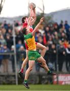2 March 2025; Anton Tohill of Derry and Hugh McFadden of Donegal during the Allianz Football League Division 1 match between Donegal and Derry at Fr Tierney Park in Ballyshannon, Donegal. Photo by Ramsey Cardy/Sportsfile
