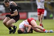2 March 2025; Conn Kilpatrick of Tyrone in action against Liam Silke of Galway during the Allianz Football League Division 1 match between Galway and Tyrone at Tuam Stadium in Tuam, Galway. Photo by Piaras Ó Mídheach/Sportsfile