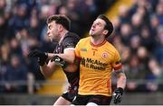 2 March 2025; Tyrone goalkeeper Niall Morgan nudges Paul Conroy of Galway as they await a dropping ball during the Allianz Football League Division 1 match between Galway and Tyrone at Tuam Stadium in Tuam, Galway. Photo by Piaras Ó Mídheach/Sportsfile