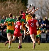 2 March 2025; Michael Murphy and Hugh McFadden of Donegal in action against Anton Tohill of Derry during the Allianz Football League Division 1 match between Donegal and Derry at Fr Tierney Park in Ballyshannon, Donegal. Photo by Ramsey Cardy/Sportsfile