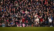 2 March 2025; Galway supporters celebrate after Shane Walsh of Galway kicked a two-point free to level the match with the last kick during the Allianz Football League Division 1 match between Galway and Tyrone at Tuam Stadium in Tuam, Galway. Photo by Piaras Ó Mídheach/Sportsfile