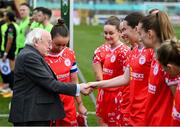 1 March 2025; President of Ireland Michael D Higgins is introduced to Shelbourne's Rebecca Devereux by captain Pearl Slattery before the 2025 Women's President's Cup match between Shelbourne and Athlone Town at Tolka Park in Dublin. Photo by Stephen McCarthy/Sportsfile