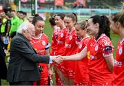 1 March 2025; President of Ireland Michael D Higgins is introduced to Shelbourne's Roma McLaughlin by captain Pearl Slattery before the 2025 Women's President's Cup match between Shelbourne and Athlone Town at Tolka Park in Dublin. Photo by Stephen McCarthy/Sportsfile