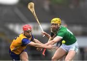 2 March 2025; Darragh Lohan of Clare in action against Seamus Flanagan of Limerick during the Allianz Hurling League Division 1A match between Limerick and Clare at TUS Gaelic Grounds in Limerick. Photo by John Sheridan/Sportsfile