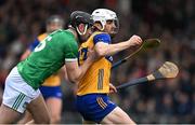 2 March 2025; Aidan McCarthy of Clare in action against Diarmaid Byrnes of Limerick during the Allianz Hurling League Division 1A match between Limerick and Clare at TUS Gaelic Grounds in Limerick. Photo by Brendan Moran/Sportsfile