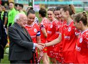 1 March 2025; President of Ireland Michael D Higgins is introduced to Shelbourne's Aoibheann Clancy by captain Pearl Slattery before the 2025 Women's President's Cup match between Shelbourne and Athlone Town at Tolka Park in Dublin. Photo by Stephen McCarthy/Sportsfile