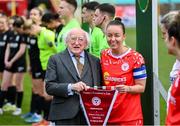 1 March 2025; President of Ireland Michael D Higgins meets Shelbourne captain Pearl Slattery before the 2025 Women's President's Cup match between Shelbourne and Athlone Town at Tolka Park in Dublin. Photo by Stephen McCarthy/Sportsfile