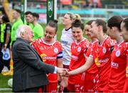 1 March 2025; President of Ireland Michael D Higgins is introduced to Shelbourne's Leah Doyle by captain Pearl Slattery before the 2025 Women's President's Cup match between Shelbourne and Athlone Town at Tolka Park in Dublin. Photo by Stephen McCarthy/Sportsfile