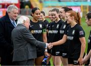 1 March 2025; President of Ireland Michael D Higgins is introduced to Athlone Town's Shauna Brennan by captain Izzy Groves before the 2025 Women's President's Cup match between Shelbourne and Athlone Town at Tolka Park in Dublin. Photo by Stephen McCarthy/Sportsfile