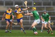 2 March 2025; Aidan McCarthy of Clare in action against Seamus Flanagan of Limerick during the Allianz Hurling League Division 1A match between Limerick and Clare at TUS Gaelic Grounds in Limerick. Photo by John Sheridan/Sportsfile