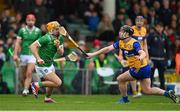 2 March 2025; Adam English of Limerick is fouled by Tony Kelly of Clare, for which Kelly was shown a yellow card, during the Allianz Hurling League Division 1A match between Limerick and Clare at TUS Gaelic Grounds in Limerick. Photo by Brendan Moran/Sportsfile