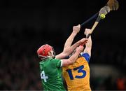 2 March 2025; Barry Nash of Limerick and Aidan McCarthy of Clare contest a dropping ball during the Allianz Hurling League Division 1A match between Limerick and Clare at TUS Gaelic Grounds in Limerick. Photo by Brendan Moran/Sportsfile