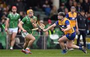 2 March 2025; Adam English of Limerick reacts after bring fouled by Tony Kelly of Clare, for which Kelly was shown a yellow card, during the Allianz Hurling League Division 1A match between Limerick and Clare at TUS Gaelic Grounds in Limerick. Photo by Brendan Moran/Sportsfile
