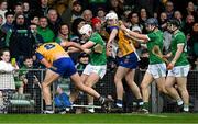 2 March 2025; Cathal Malone of Clare, 8 and Aaron Gillane of Limerick tussle during the Allianz Hurling League Division 1A match between Limerick and Clare at TUS Gaelic Grounds in Limerick. Photo by Brendan Moran/Sportsfile