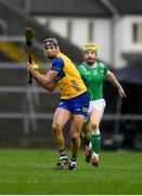 2 March 2025; Cathal Malone of Clare in action against Seamus Flanagan of Limerick during the Allianz Hurling League Division 1A match between Limerick and Clare at TUS Gaelic Grounds in Limerick. Photo by John Sheridan/Sportsfile