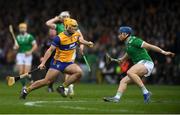 2 March 2025; Mark Rodgers of Clare in action against Mike Casey of Limerick during the Allianz Hurling League Division 1A match between Limerick and Clare at TUS Gaelic Grounds in Limerick. Photo by John Sheridan/Sportsfile