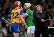 2 March 2025; Aaron Gillane of Limerick and Conor Leen of Clare with referee Thomas Walsh during the Allianz Hurling League Division 1A match between Limerick and Clare at TUS Gaelic Grounds in Limerick. Photo by Brendan Moran/Sportsfile