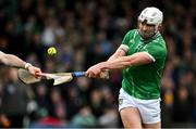 2 March 2025; Aaron Gillane of Limerick has a shot blocked by Darragh Lohan of Clare during the Allianz Hurling League Division 1A match between Limerick and Clare at TUS Gaelic Grounds in Limerick. Photo by Brendan Moran/Sportsfile
