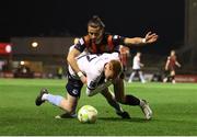 3 March 2025; Connor Parsons of Bohemians is tackled by Shane Farrell of Drogheda United during the SSE Airtricity Men's Premier Division match between Bohemians and Drogheda United at Dalymount Park in Dublin. Photo by Thomas Flinkow/Sportsfile