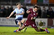 3 March 2025; John Martin of Shelbourne in action against Greg Cunningham of Galway United during the SSE Airtricity Men's Premier Division match between Galway United and Shelbourne at Eamonn Deacy Park in Galway. Photo by Ben McShane/Sportsfile