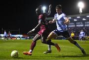 3 March 2025; Jeannot Esua of Galway United in action against Lewis Temple of Shelbourne during the SSE Airtricity Men's Premier Division match between Galway United and Shelbourne at Eamonn Deacy Park in Galway. Photo by Ben McShane/Sportsfile