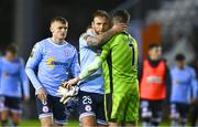 3 March 2025; Paddy Barrett of Shelbourne shares a moment with Galway United goalkeeper Brendan Clarke after their side's drawn SSE Airtricity Men's Premier Division match between Galway United and Shelbourne at Eamonn Deacy Park in Galway. Photo by Ben McShane/Sportsfile