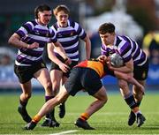 4 March 2025; Niall Fallon of Terenure College is tackled by Rohan O'Shea of St Fintan's High School during the Bank of Ireland Leinster Schools Senior Cup semi-final match between St Fintan's High School and Terenure College at Energia Park in Dublin. Photo by Shauna Clinton/Sportsfile