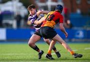 4 March 2025; Niall Fallon of Terenure College is tackled by Marcel Haas of St Fintan's High School during the Bank of Ireland Leinster Schools Senior Cup semi-final match between St Fintan's High School and Terenure College at Energia Park in Dublin. Photo by Shauna Clinton/Sportsfile