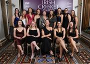 6 March 2025; Ireland women's international players, back row from left, Arlene Kelly, Georgina Dempsey, Gaby Lewis, Sophie McMahon, Laura Delany, Cara Murray, Alice Tector, Jane Maguire, and Sarah Forbes, front row from left, Christina Coulter Reilly, Freya Sargent, Orla Prendergast, Amy Hunter and Aimee Maguire, during the Business Plus Irish Cricket Awards at The College Green Hotel in Dublin. Photo by Seb Daly/Sportsfile