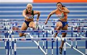 6 March 2025; Sarah Lavin of Ireland, left, competes in the women's 60m hurdles during day one of the European Athletics Indoor Championships 2025 at the Omnisport Apeldoorn in Apeldoorn, Netherlands. Photo by Sam Barnes/Sportsfile