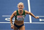 7 March 2025; Sarah Lavin of Ireland crosses the finish line to finish second in the women's 60m hurdles semi-final during day two of the European Athletics Indoor Championships 2025 at the Omnisport Apeldoorn in Apeldoorn, Netherlands. Photo by Sam Barnes/Sportsfile