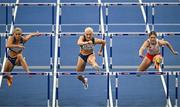 7 March 2025; Sarah Lavin of Ireland, centre, on her way to finishing second in the women's 60m hurdles semi-final during day two of the European Athletics Indoor Championships 2025 at the Omnisport Apeldoorn in Apeldoorn, Netherlands. Photo by Sam Barnes/Sportsfile